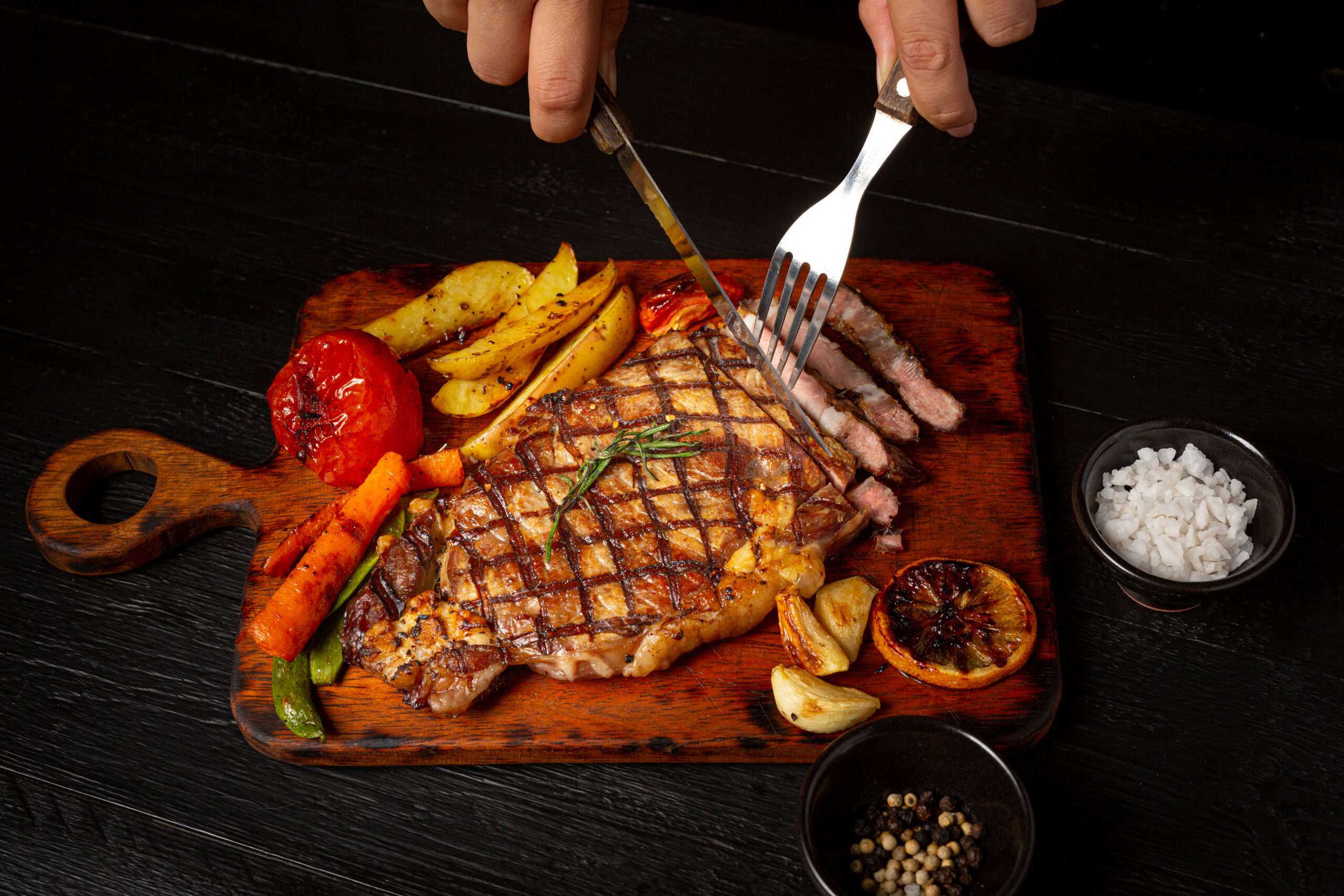 6 Best Places for Sizzlers in Mumbai 2023 3 grilled beef steak dark wooden surface scaled